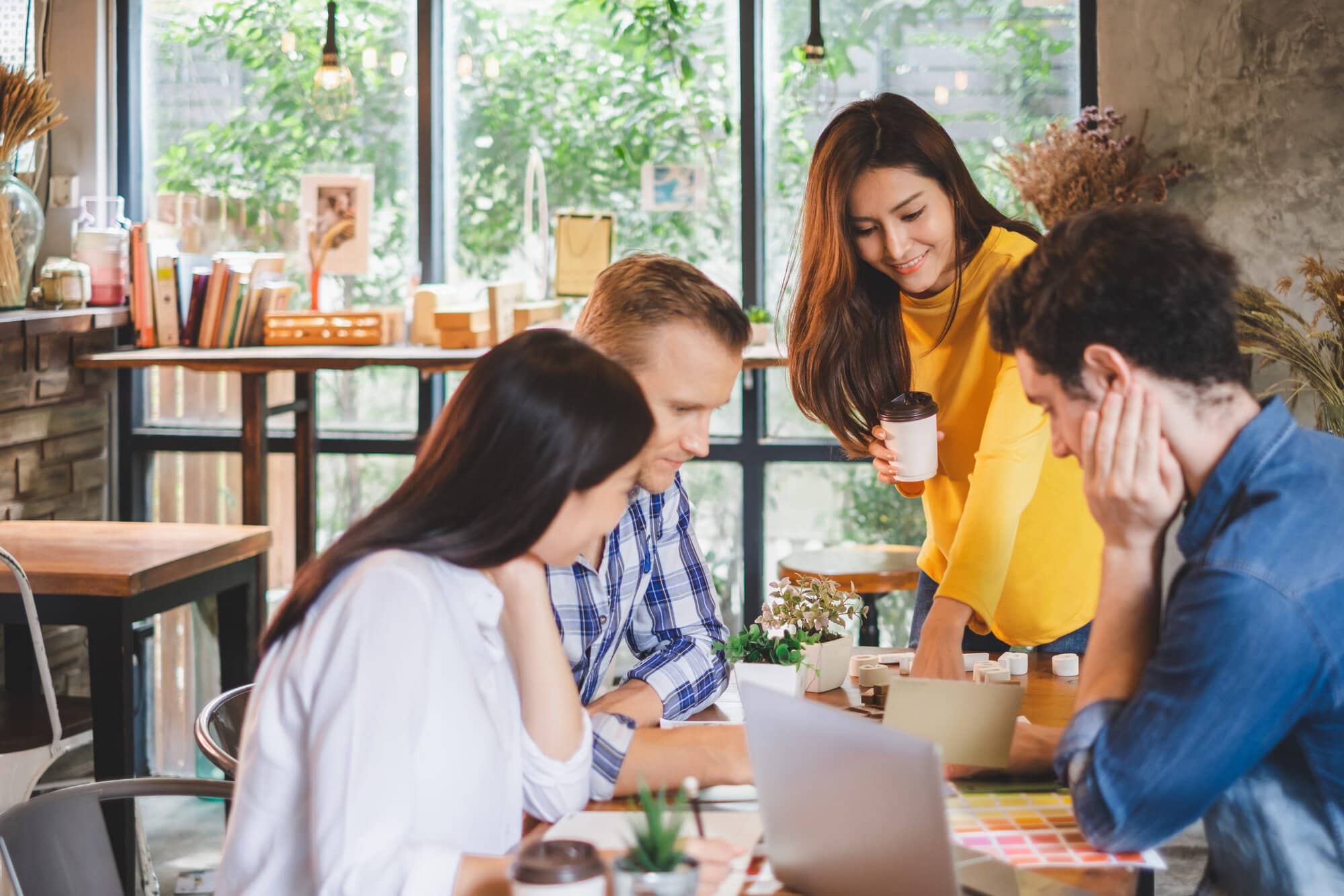 Group,Of,Young,Creative,Business,Team,Discussing,And,Meeting,At