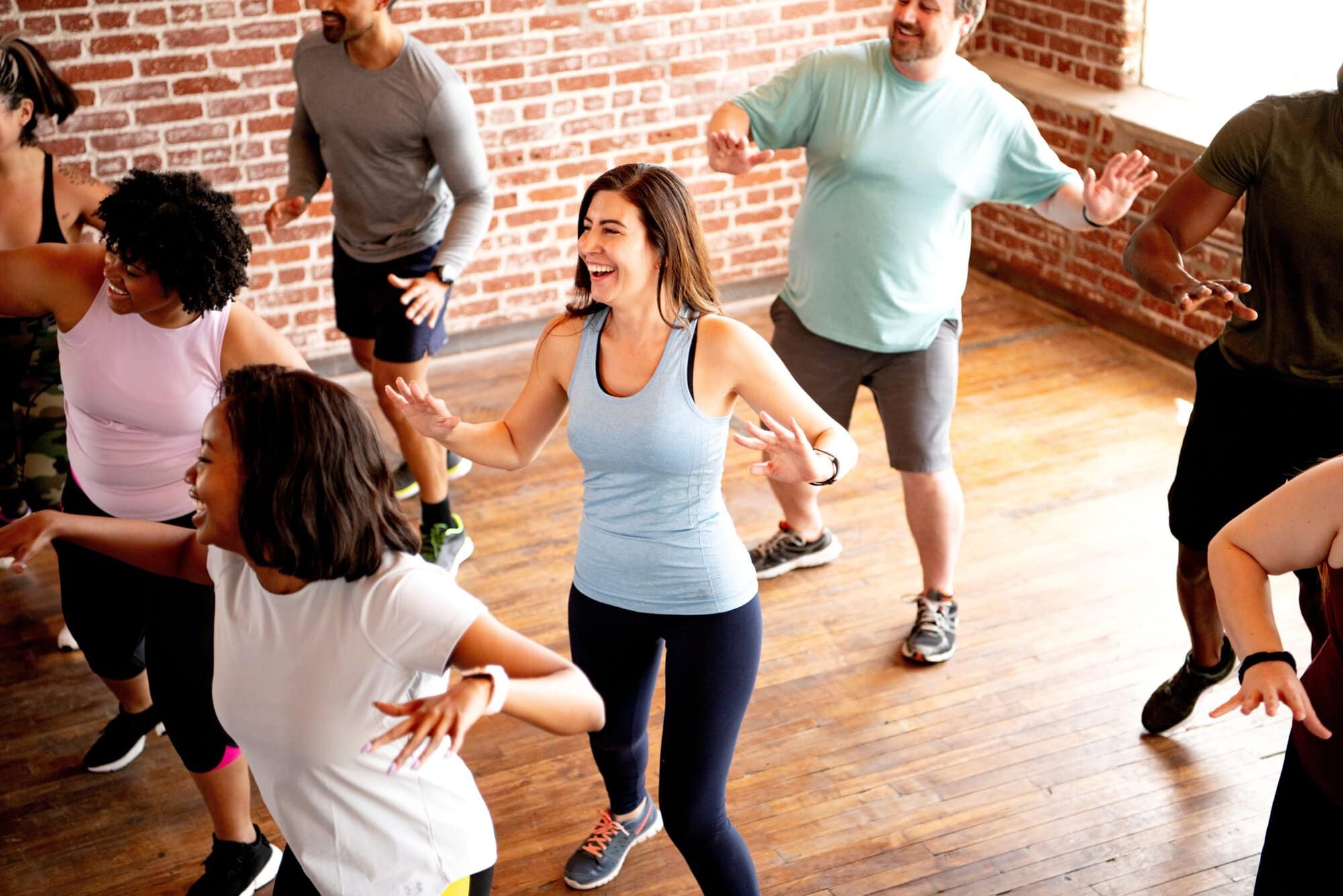 Group,Dance,Class,With,Diverse,Participants,Exercising,Together.,People,Enjoying